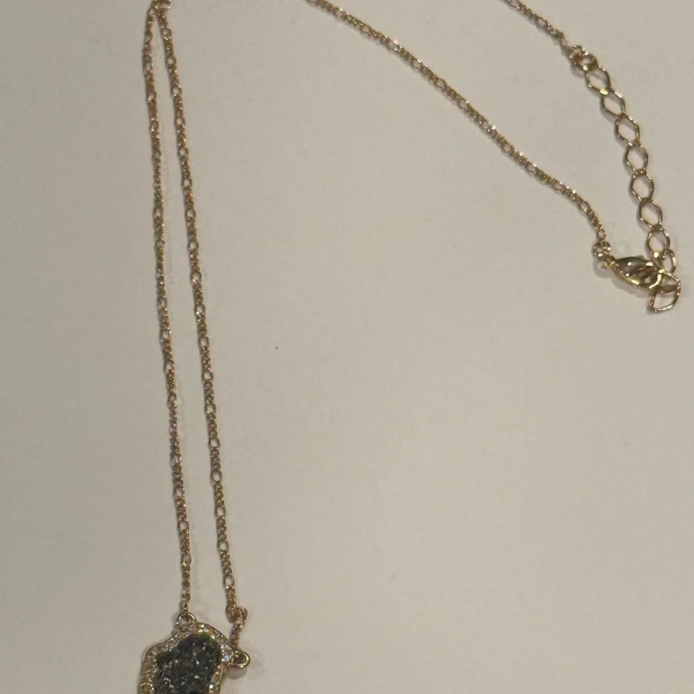Elegant Gold and Silver Pendant Necklace